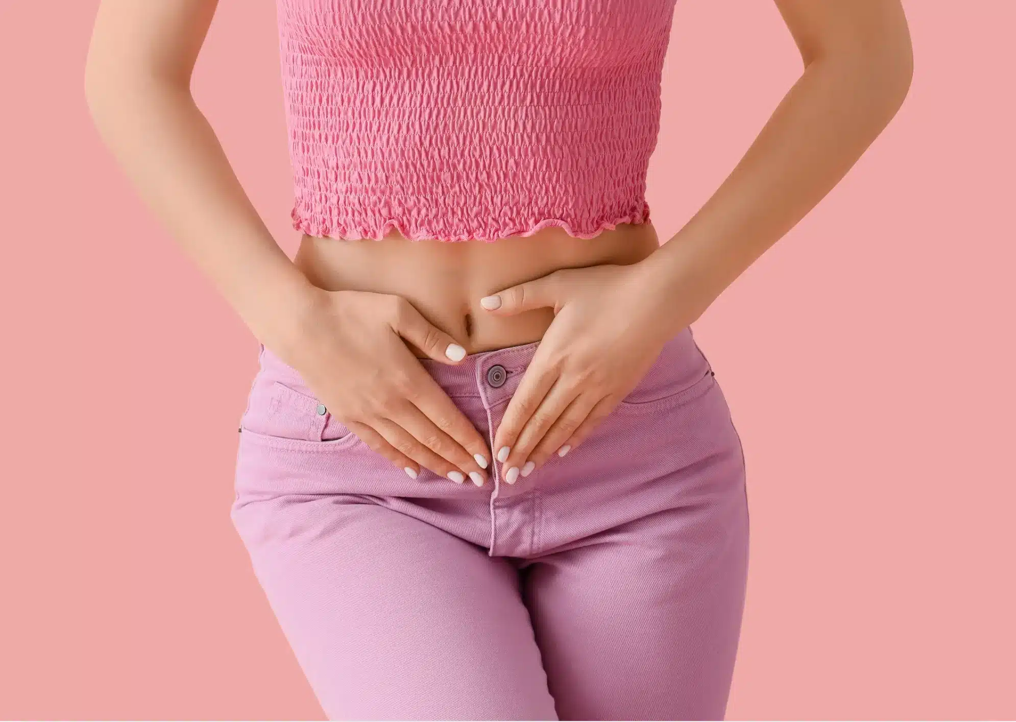 female holding her tummy area